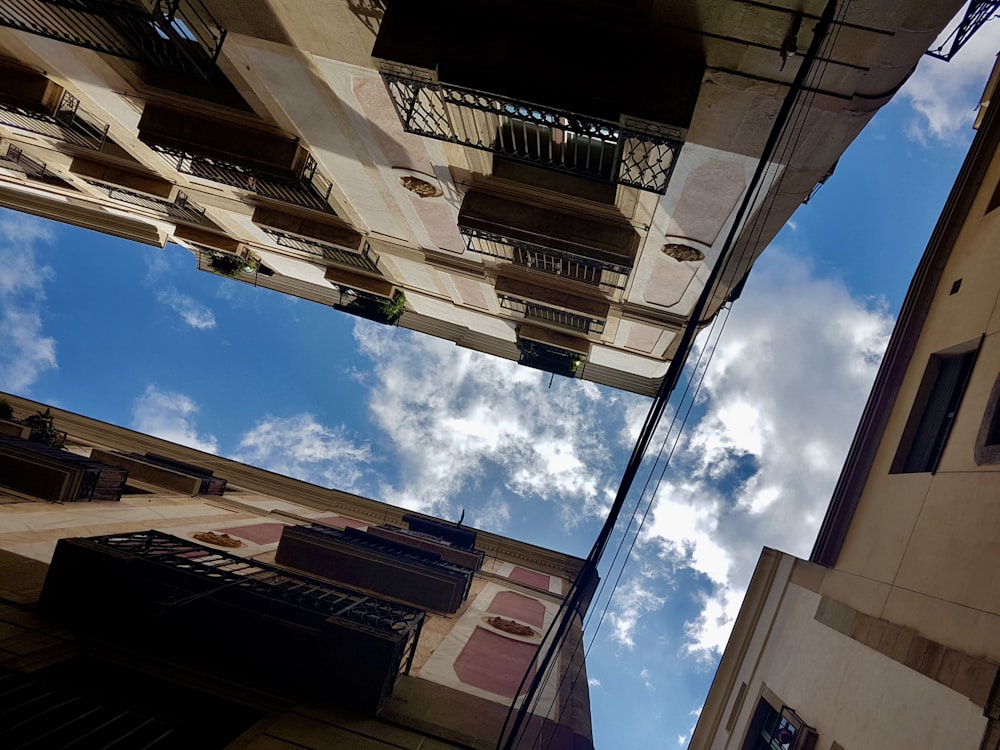 brown concrete building under blue sky during daytime