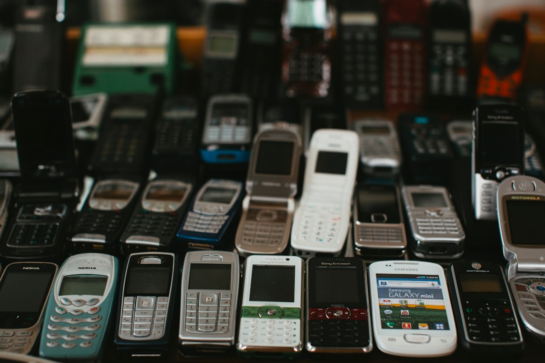 black and white candybar phones, Vintage mobile telephones no smartphone.Visit this utmost insane vintage museum in Nuremberg: MERKS MOTOR MUSEUM (www.merks-motor-museum.de)