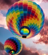 blue yellow and red hot air balloon under blue sky