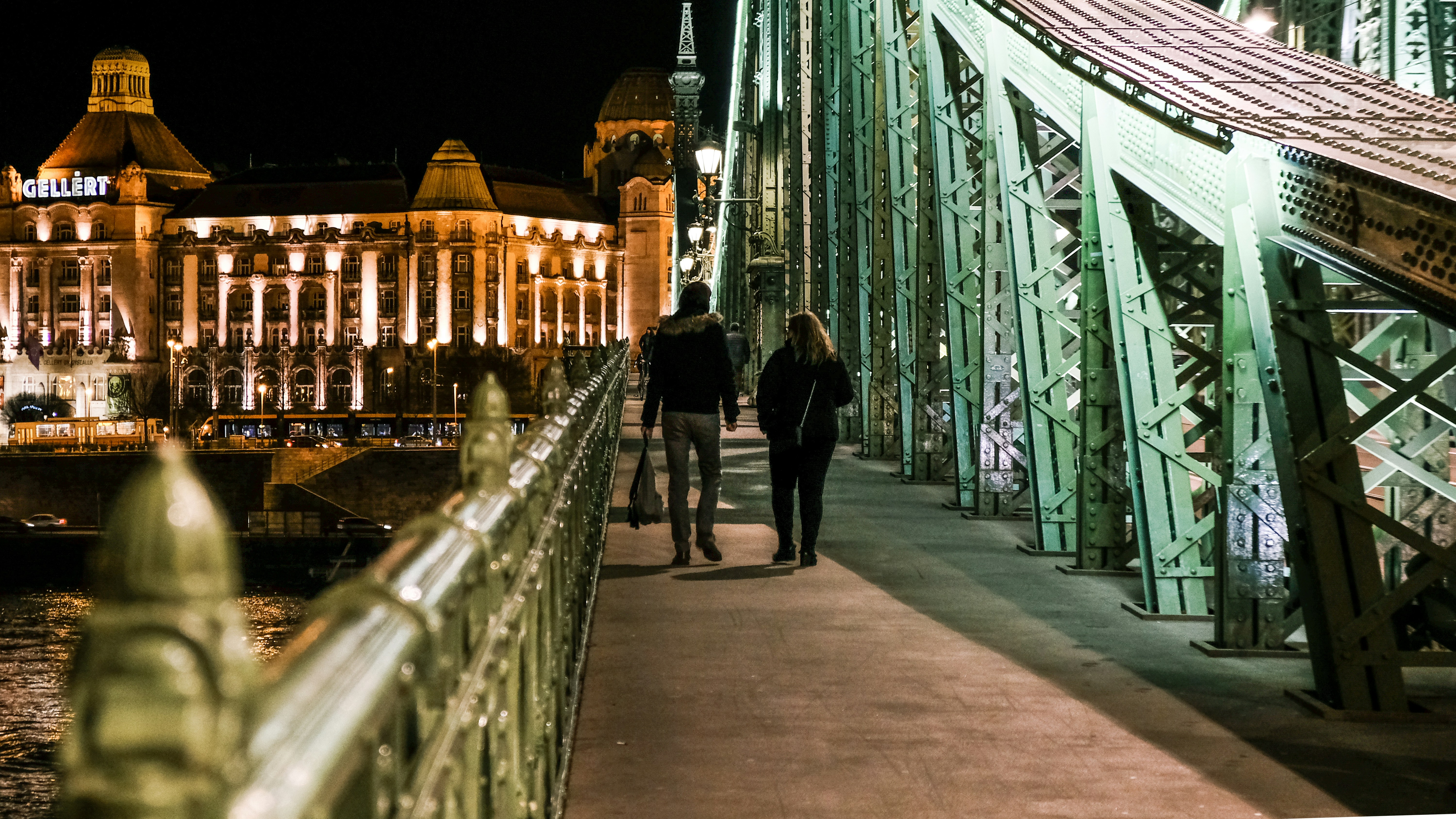 Pair walking on the Bridge of Freedom