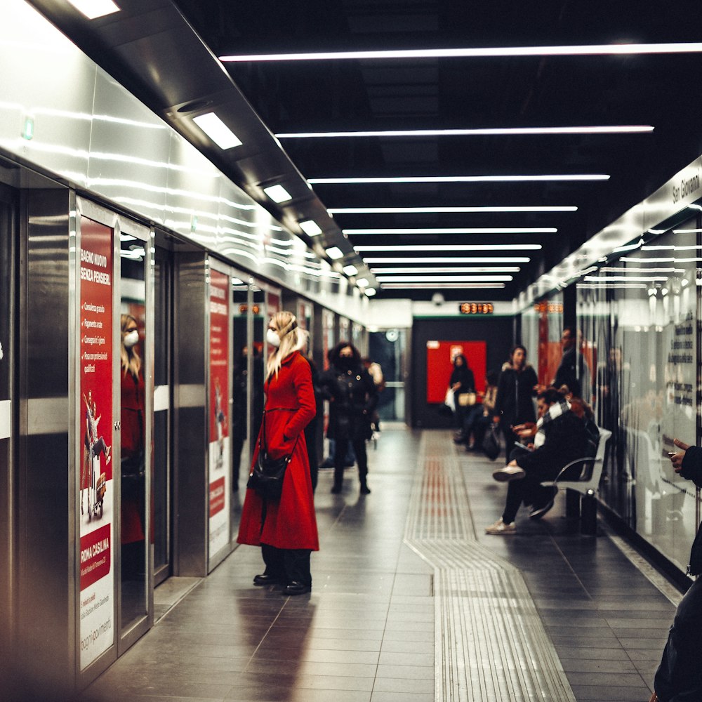 people walking on train station