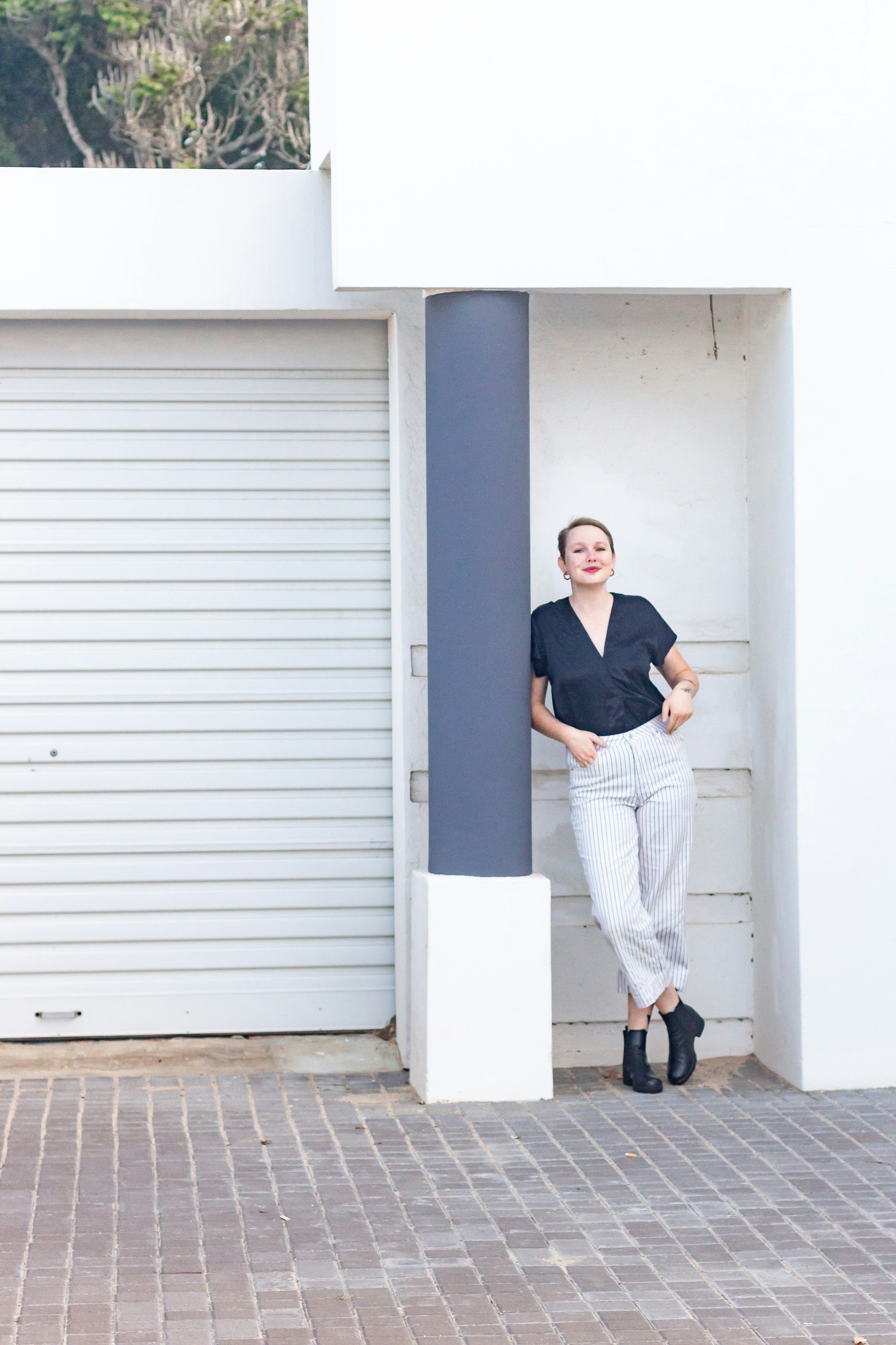 black polo beige pants