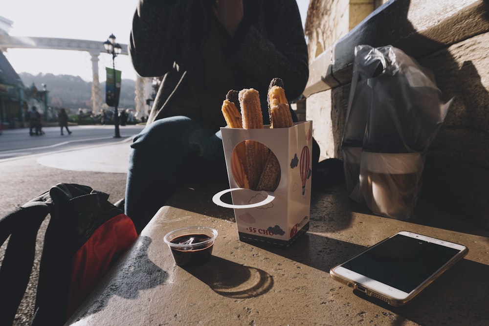 brown bread on white and red carton box