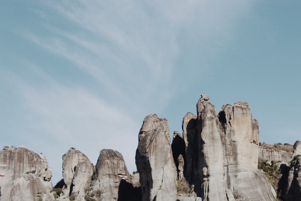 brown rock formation under blue sky during daytime