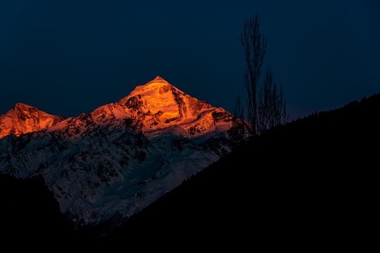 snow covered mountain during night time in Mestia Georgia