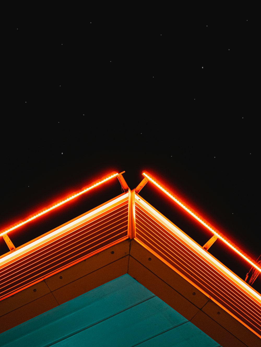 blue and brown wooden house during night time