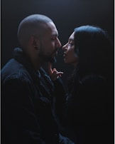 An intimate moment between two characters in a romantic setting.