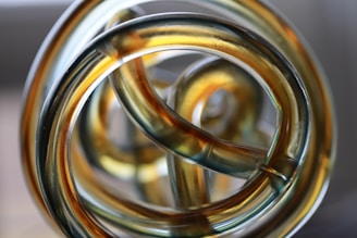 A close-up of a twisted, colorful sculpture with unexpected textures.