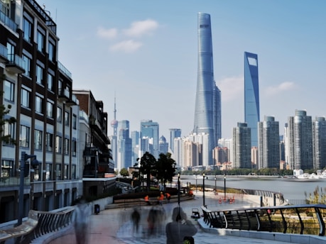 A bustling Canadian city skyline with people commuting to work.