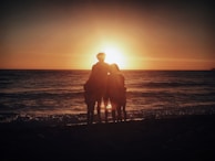 A family waving goodbye as they move to a new home.
