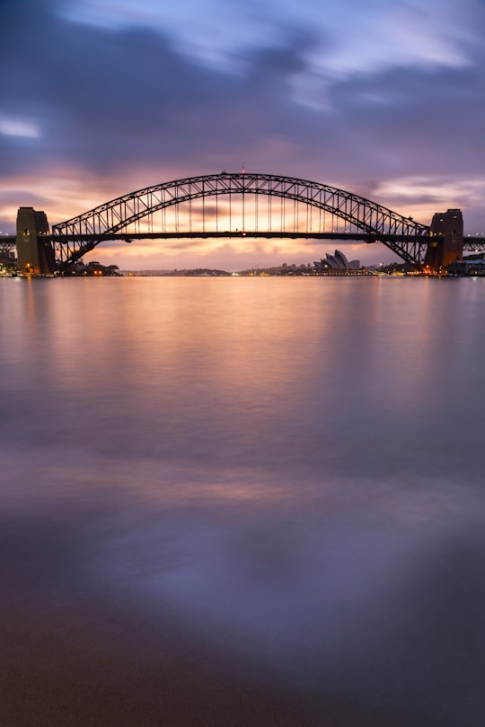 bridge over water during night time in Blues Point Reserve Australia