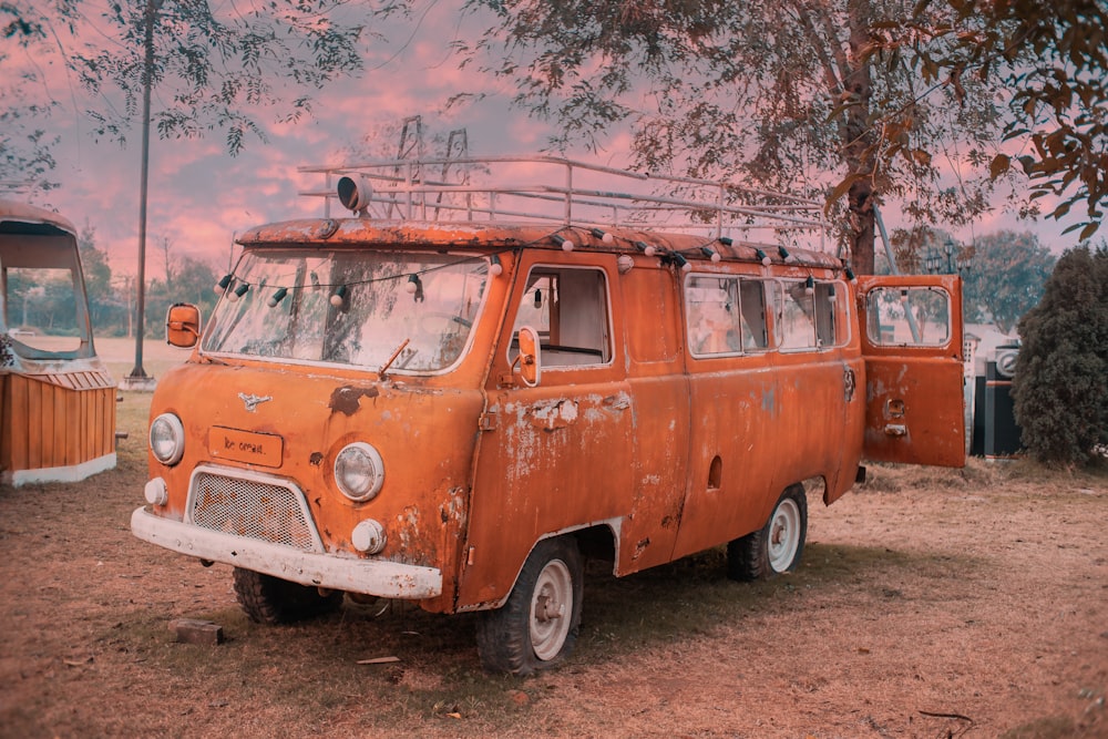 orange and white volkswagen t-2 van