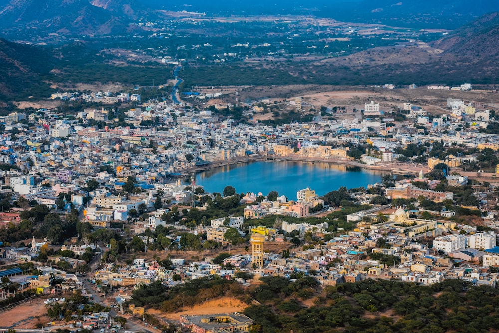 aerial view of city near body of water during daytime