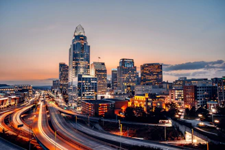 Modern cityscape with smart infrastructure and advanced technology integration at dusk.