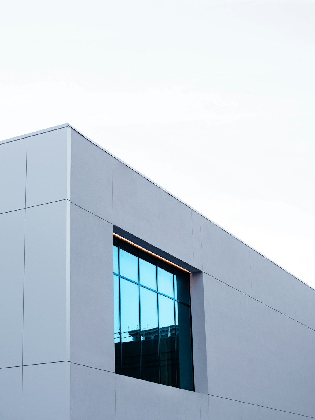 gray concrete building under white sky during daytime