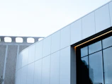 Aerial shot of a completed luxury commercial building showcasing clean lines and modern design.