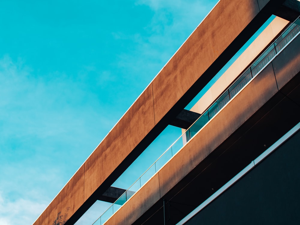 brown concrete building under blue sky during daytime