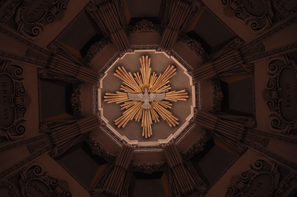 brown and white ceiling with light fixture