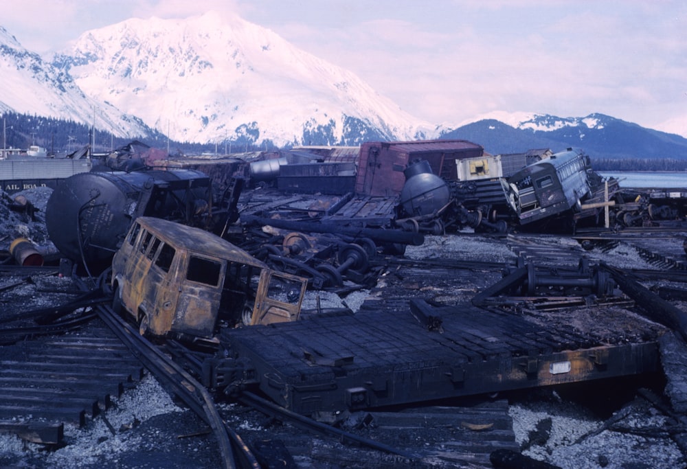 brown and black wrecked ship on brown field during daytime