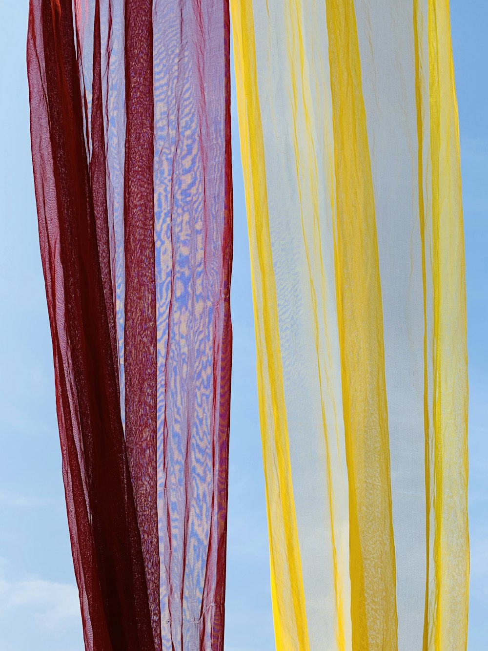 red yellow and blue striped textile