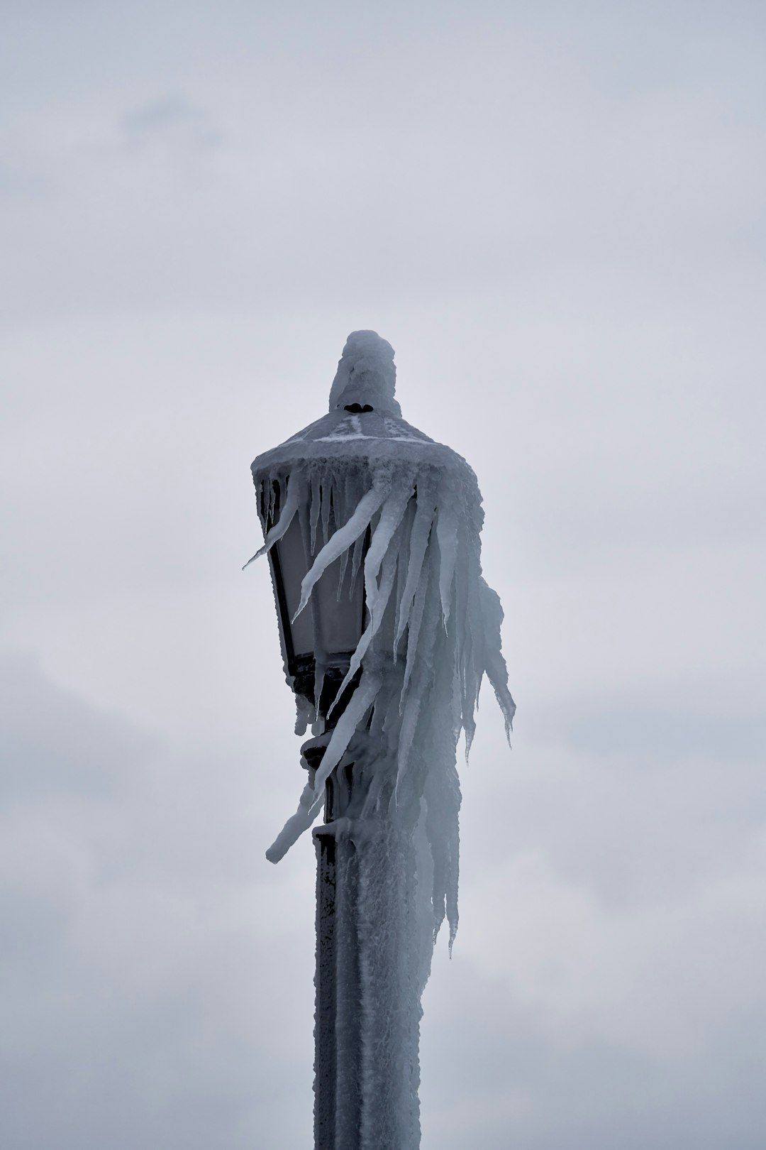 statue of liberty under white sky during daytime