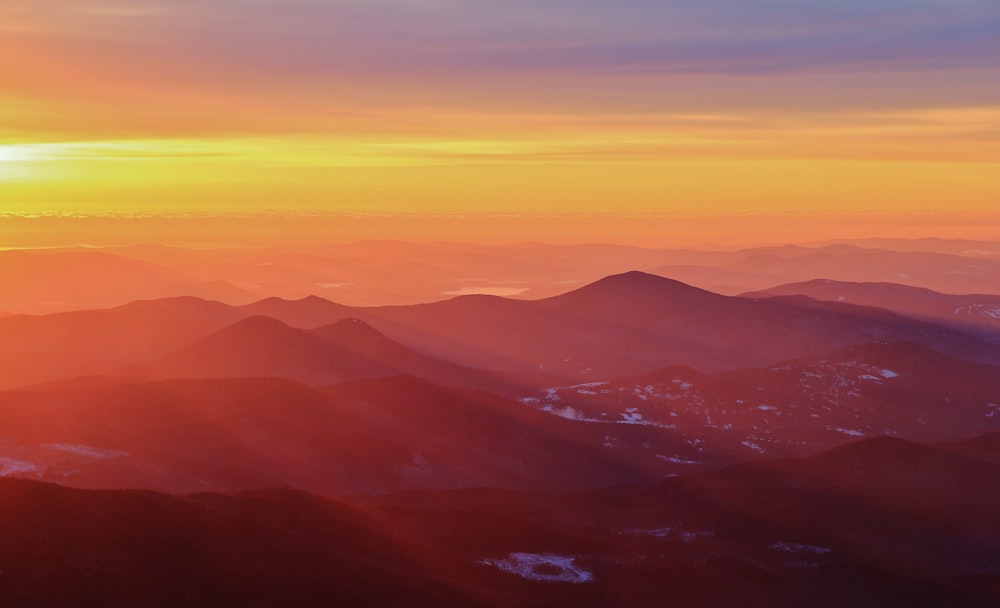 aerial view of mountains during sunset