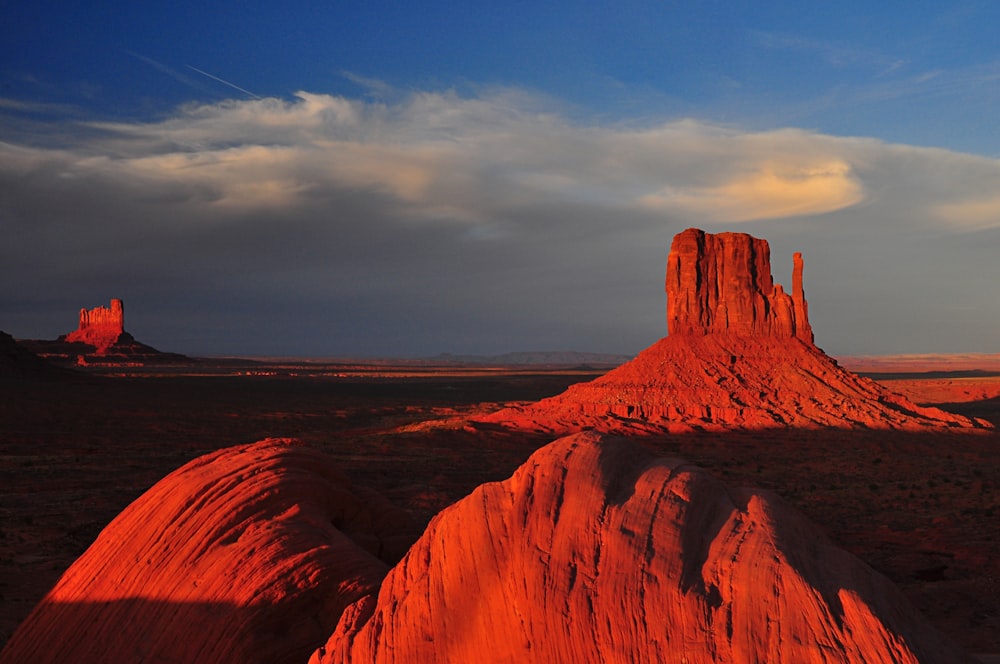 brown rock formation under cloudy sky during daytime