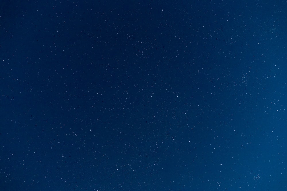 blue sky with stars during night time