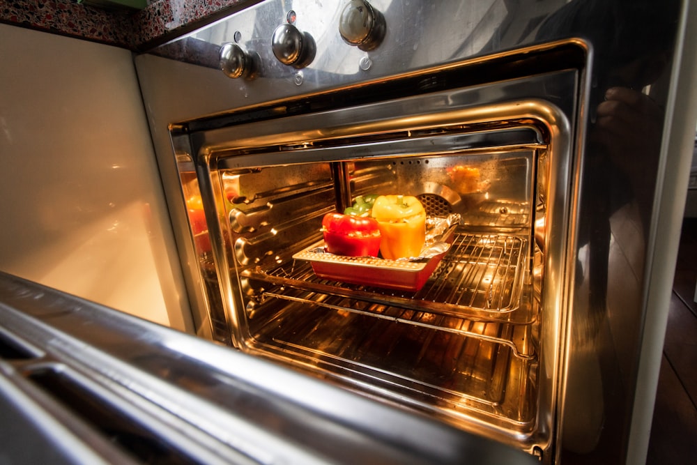 stainless steel oven with foods