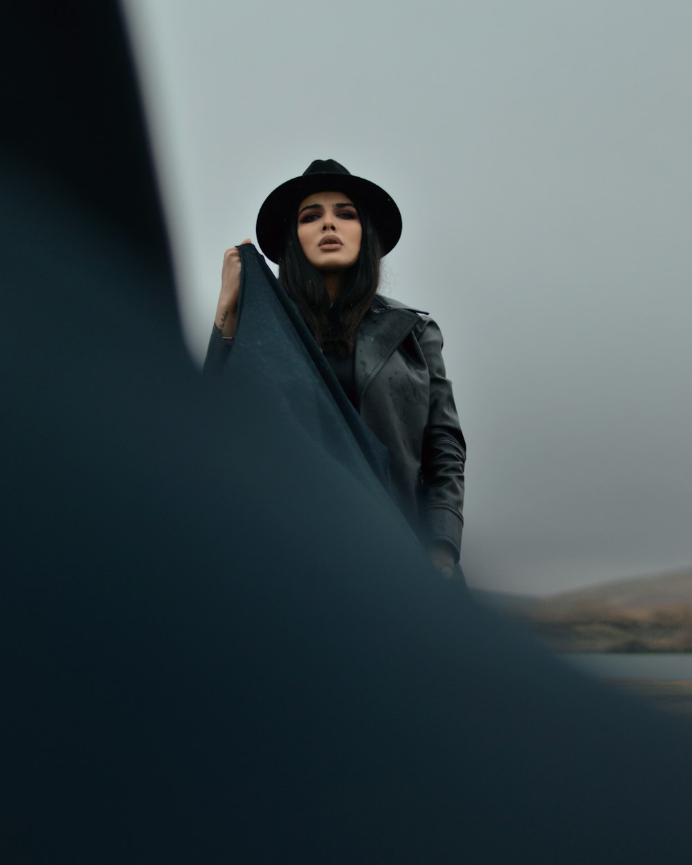 woman in black leather jacket