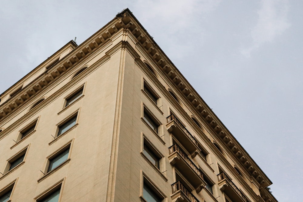 brown concrete building under blue sky during daytime