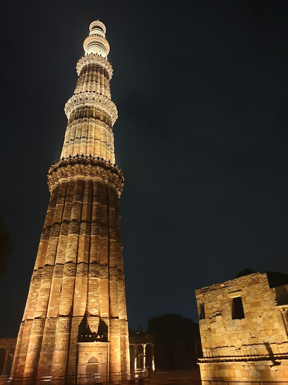 brown concrete tower during night time