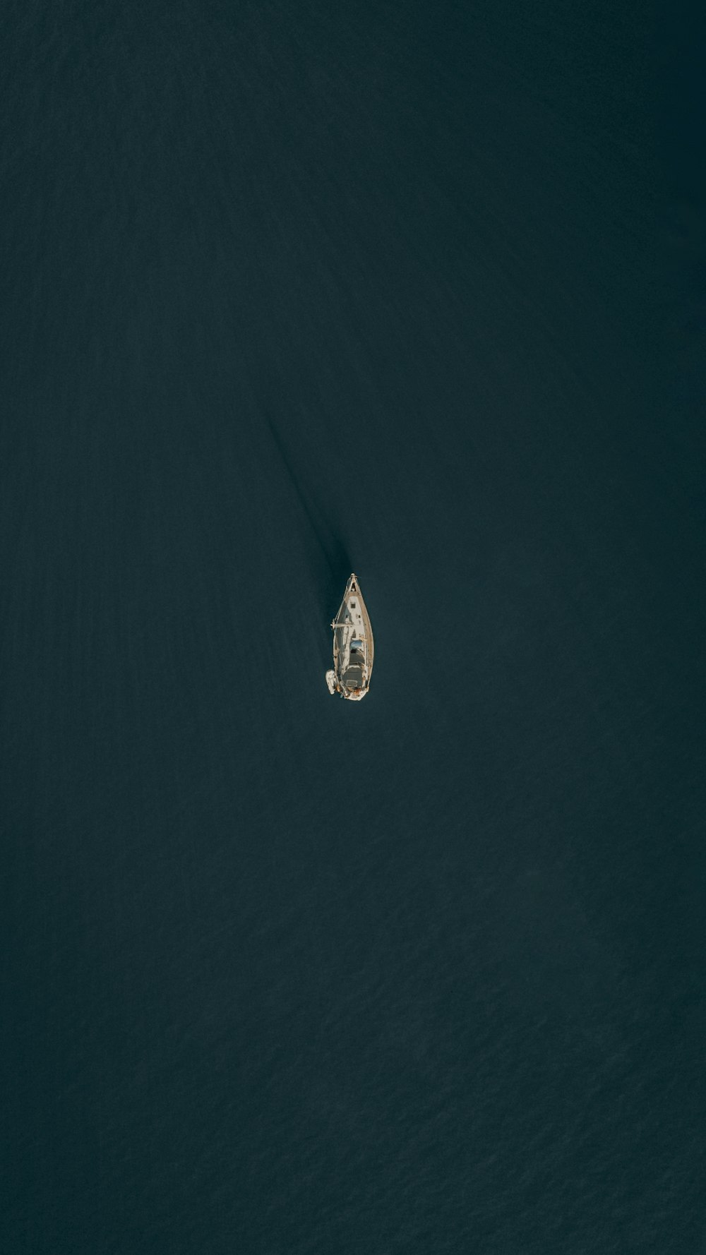 aerial view of boat on sea during daytime