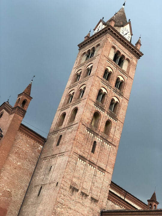 brown concrete building under blue sky during daytime in 12051 Alba Italy