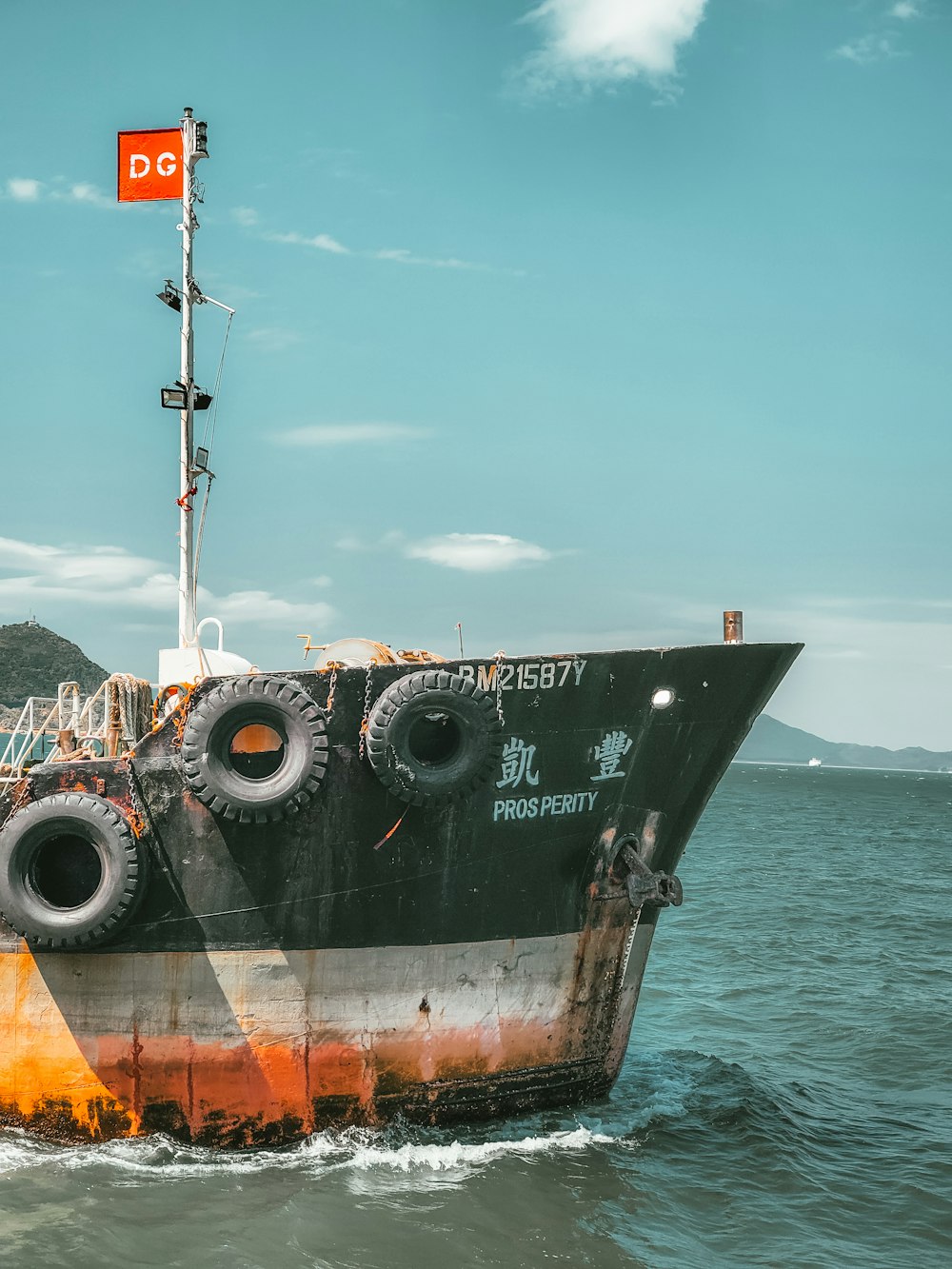 black and white ship on sea during daytime