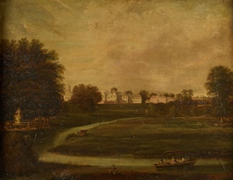 A serene landscape featuring a large estate with multiple buildings in the background, partially obscured by trees. A calm river flows across the scene, curving gently. In the foreground, people are seen sitting and fishing by the riverbank, while a group of people are in a boat on the river. The surrounding area is lush with greenery, featuring large trees, open grassy areas, and a variety of plants.