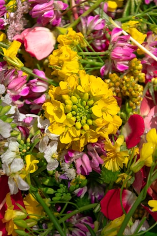 A vibrant floral arrangement showcasing a variety of colorful flowers.