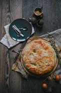 pie on brown wooden table