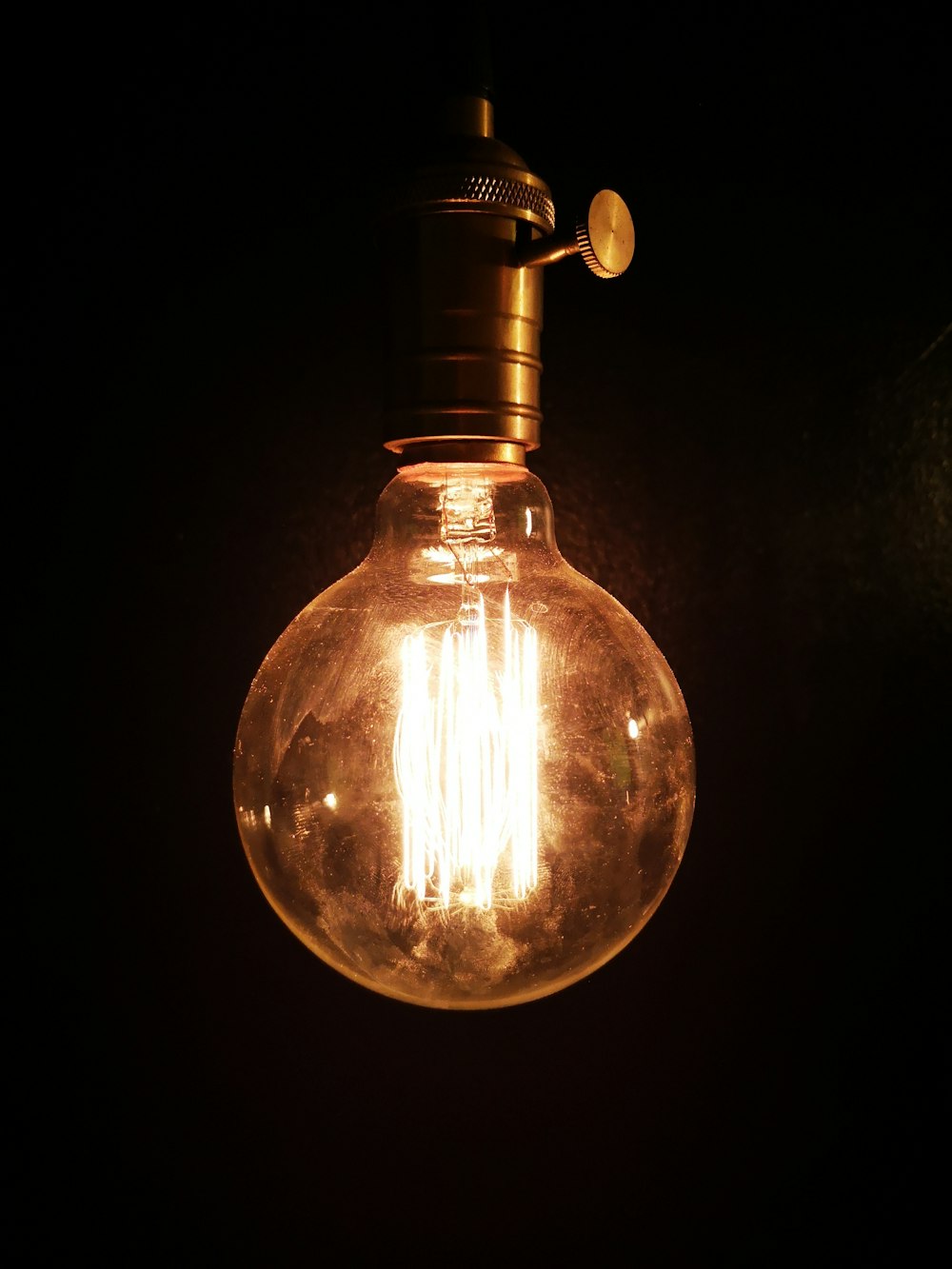 clear glass bulb with black background