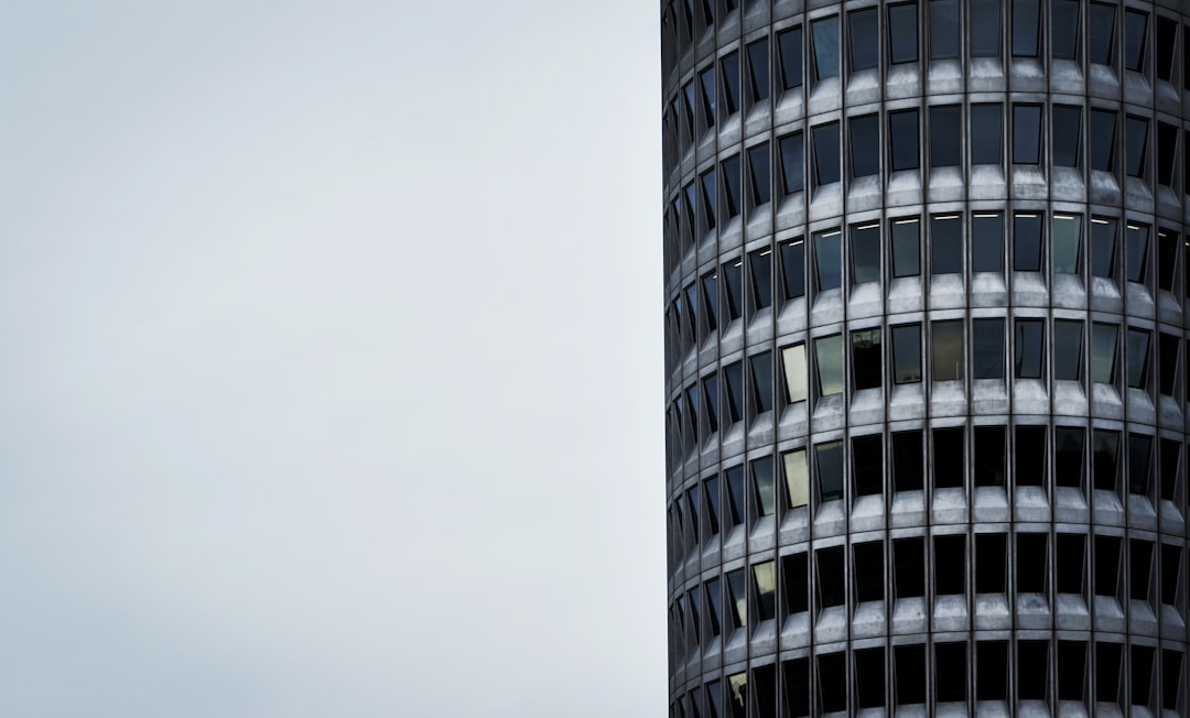 gray concrete building under white sky during daytime