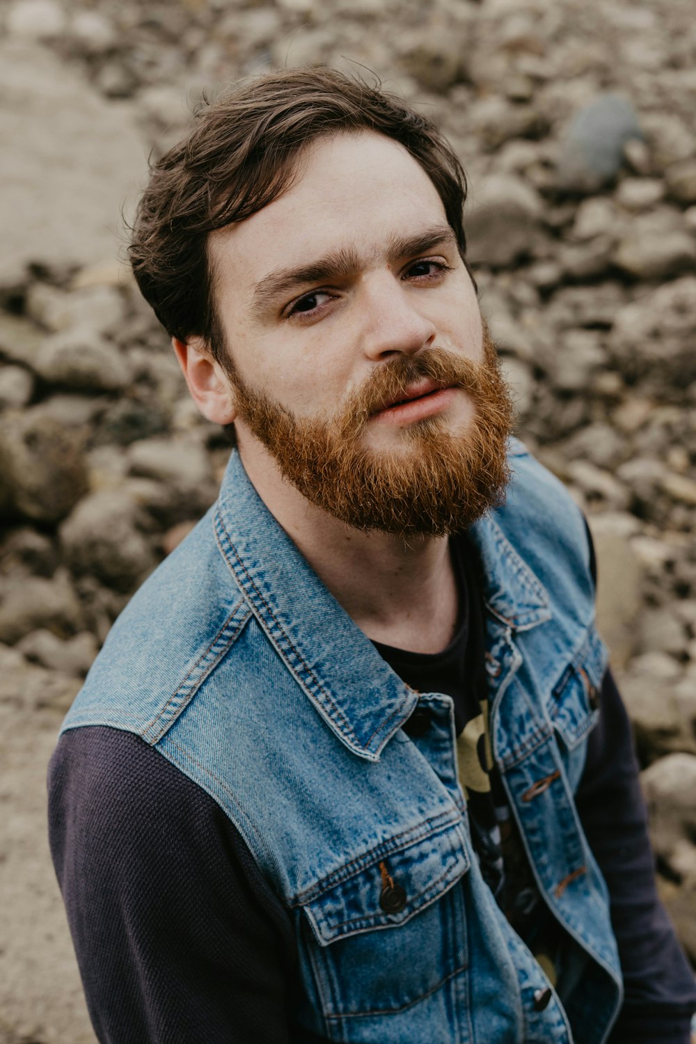 man in blue denim jacket