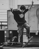 A skateboarder performing tricks in an urban environment.