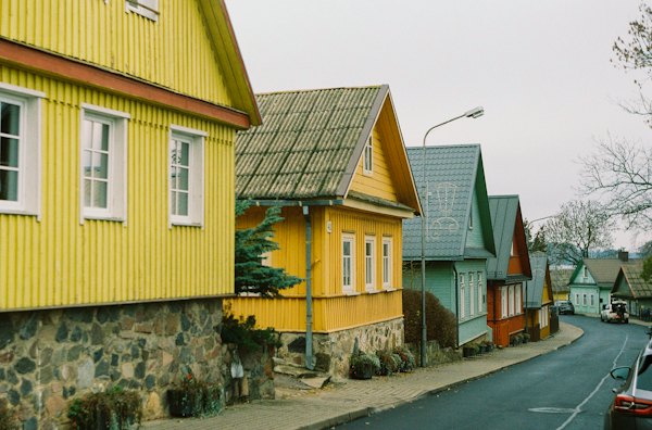 Yellow and brown wooden house — Trakai, Lithuania
