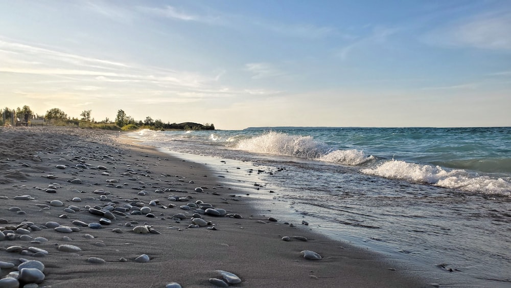 gray stones on seashore during daytime