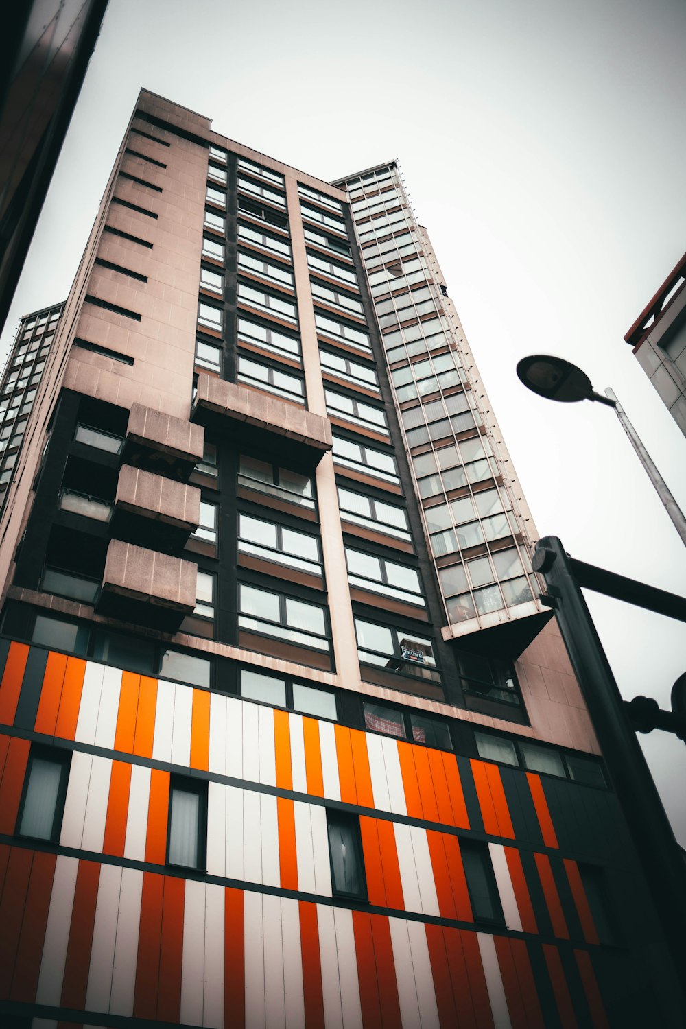 brown and white concrete building during daytime