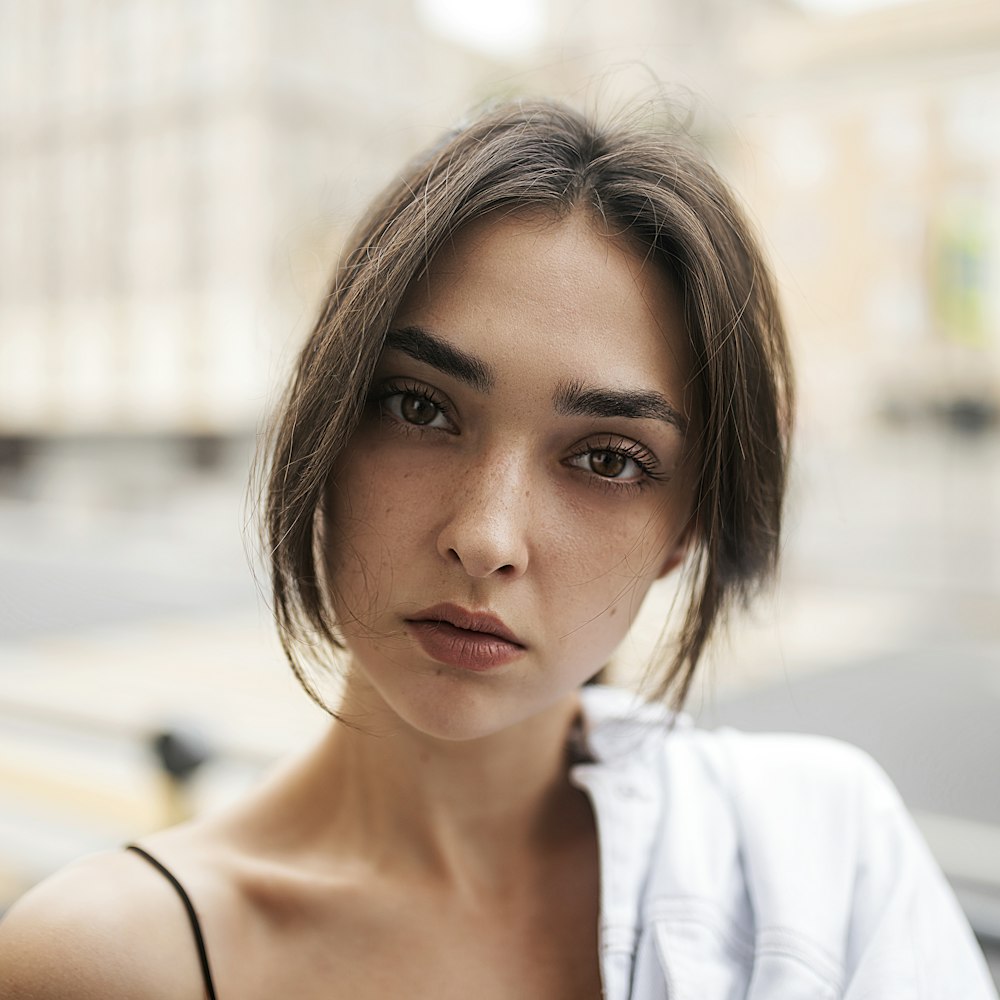 woman in white shirt smiling