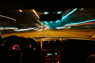 person driving car during night time