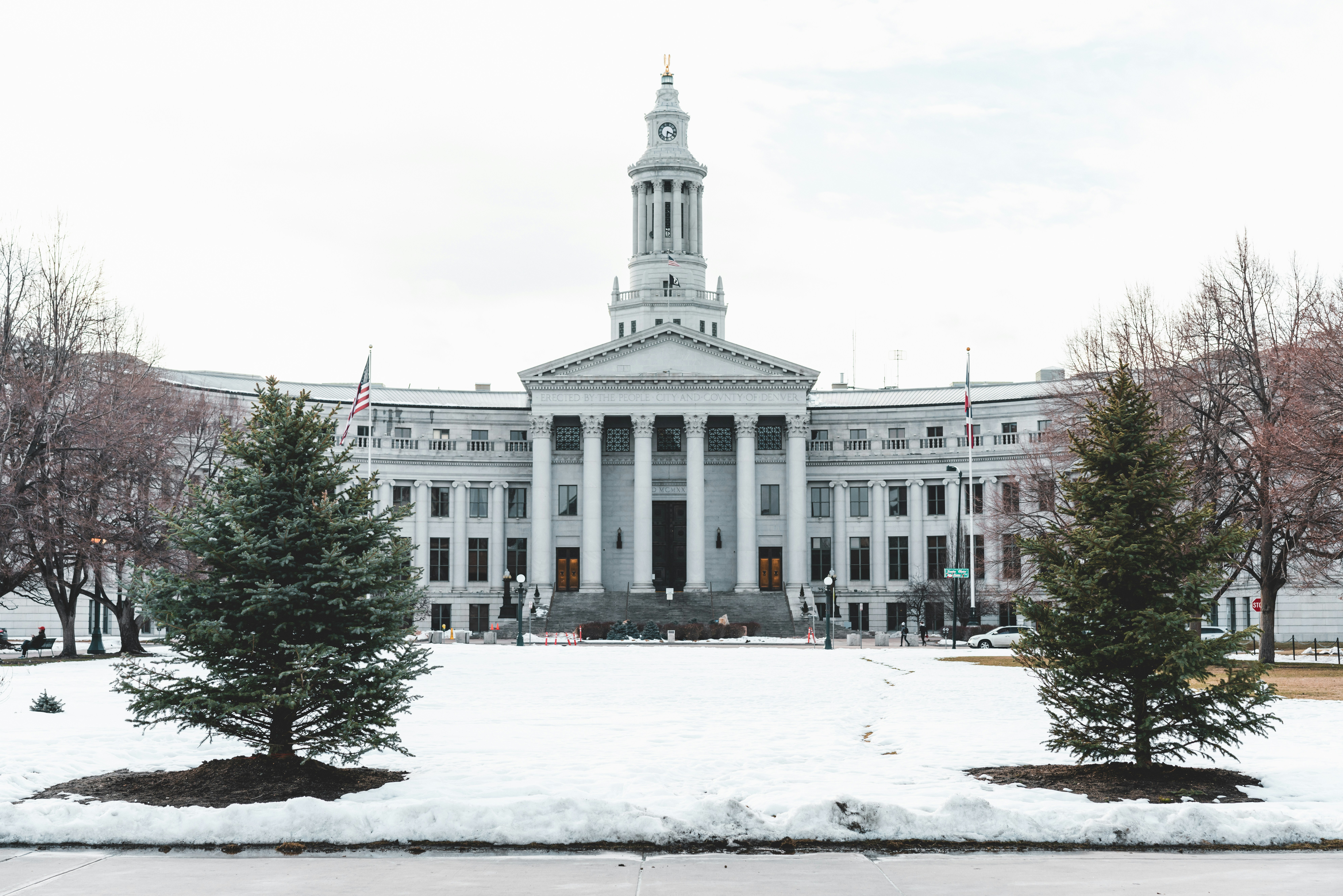 white concrete building under white sky during daytime
