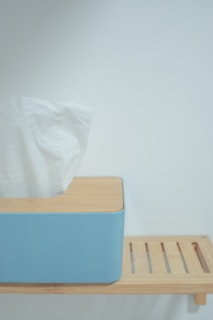 An elegant tissue box placed in a modern living room.