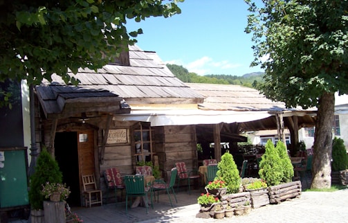 Cozy rural roadside snack bar with welcoming entrance and rustic charm.